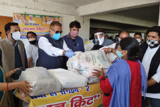 Cabinet Minister Ganesh Joshi distributed ration to the needy, blown away the Corona guide line