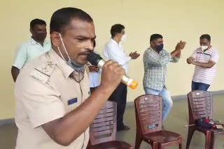 Police officer sung a song in Covid care center at Belur Hassan