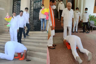 Karnataka MLA touches CM Yeddyurappa's feet  before taking oath