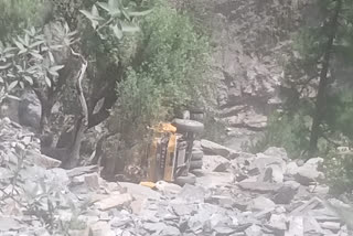 Tipper loaded with coal tar rolled into a ditch