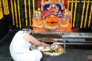 Priests worshiping Shani Dev