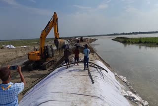embankment-repearing-going-on-over-jiadhal-river-in-dhemaji