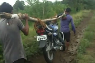 bike lifted on shoulder