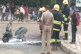 scooty catchs fire in front of ramadevi university in bhubaneswar