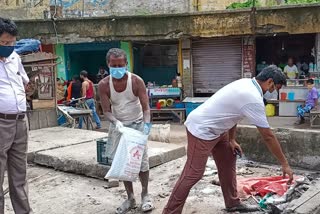 two officers spent jamai sasthi day by cleaning street garbage in malda