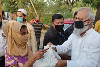 somnath bharti distribute ration kit to needy