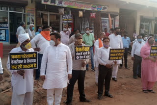 BJP workers protest against Aam Aadmi Party MLA