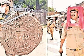 DGP orders probe as cops use chair  basket as riot gear  cops use chair, basket as riot gear  യുപി പൊലീസ്  ഉത്തര്‍പ്രദേശ് ഡിജിപി