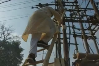 Energy Minister Pradyuman Singh Tomar has climbed atop transformer and cleaned it