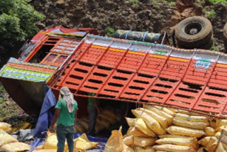 truck carrying bags of manure overturned in Dharur Ghat on Sunday morning