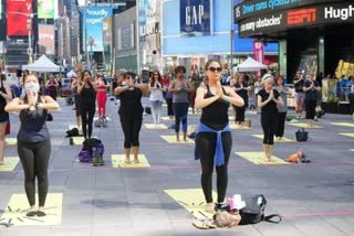 Over 3,000 people perform Yoga at iconic Times Square