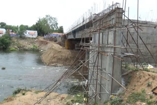 bhavanisahar dam  erode bhavanisahar dam  erode bridge development work was going on bhavanisahar dam  bridge development work was going on bhavanisahar dam  erode news  bhavanisahar dam  ஈரோடு செய்திகள்  ஈரோடு பவானிசாகர் அணை  பவானிசாகர் அணை  பவானிசாகர் அணை பாலம் கட்டுமானப் பணி  பவானிசாகர் அணை புதிய பாலம் கட்டுமானப் பணி தீவிரம்