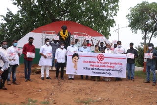 janasena vishaka corporators protest over taxes