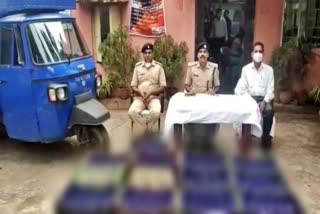 police caught liquor laden on vegetables in vehicle