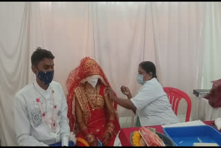 couple gets vaccine jab in khajrana ganesh temple indore