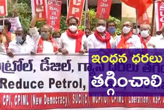 Left parties dharna, reduce oil prices demand
