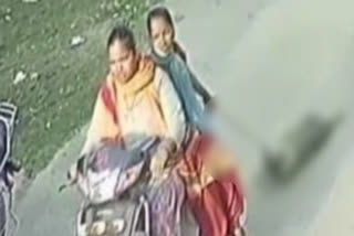 Two women drag dog on scooter; video goes viral