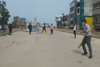 youth protest playing cricket