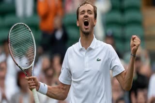 Medvedev rallies to overcome Cilic in five-setter