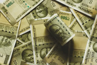 Rupee gains 43 paise to 74.31 against US dollar