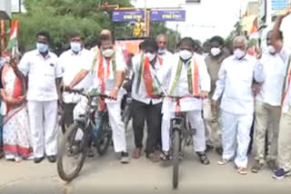Congress bicycle rally against on   petrol and diesel price hike at tirupathi