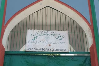 delhi qaumi senior secondary school students study under a tin shed