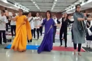 People perform Yoga with Garba in Gujarat