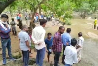 Be careful! to make Selfie is dangerous on waterfall in rain