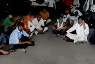 Villagers sitting on dharna in police station