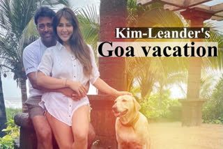 Kim Sharma and Leander Paes are seen posing in the backdrop of a beach