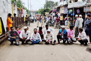 max step foundation members protest in malegaon