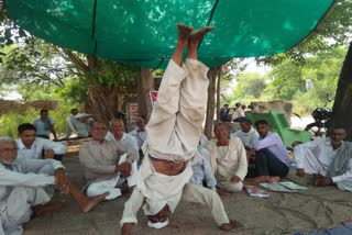 farmer headstand two hours bhiwani