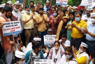 AAP protest against BJP over sunderlal bahuguna issue