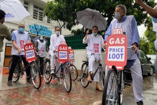 Trinamool MPs cycle to Parliament to protest fuel price hike