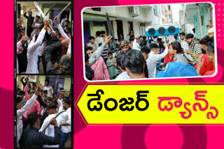 youth dance with swords in baraat in hyderabad old city