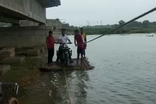 People crossing bridge risking their lives in Ramgarh