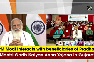 pm talks to beneficiaries of gharib kalyan anna yojana in gujarat