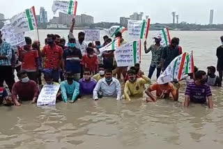 TMC youth and student union members of Howrah protest the attack in Tripura
