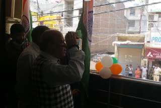 adesh gupta hoisted flag at sangam vihar in delhi