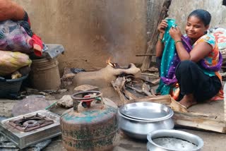 girl cooking with wood