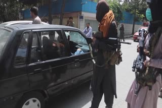 Taliban fighters patrol Kabul streets