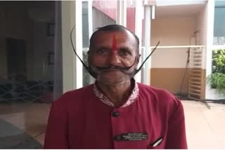 mp-ujjain-thakur-vijay-singh-have-2-feet-long-mustache