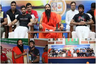 baba-ramdev-honored-olympic-medalist-ravi-dahiya-and-wrestling-players-at-patanjali-yogpeeth