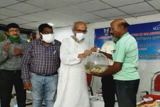 Balasore mp distribute fish and fish food to fish farmer