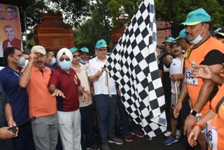 Chief Minister Pushkar Singh Dhami flags off