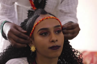 Ethiopian refugee women mark traditional holiday