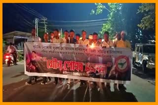 candle-rally-for-demand-of-women-protection-bill-in-lakhimpur