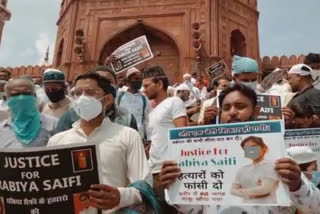 protest outside Jama Masjid against murder of civil defense personnel girl