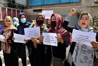 dozens march for womens rights at kabul palace