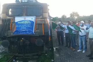 Tata and railway officials flagging off at the railway yard